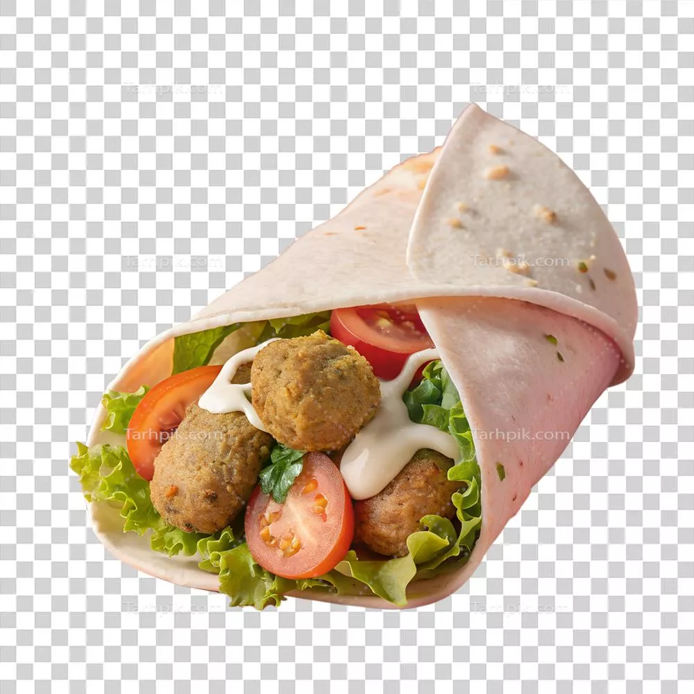 پیراشکی فلافل خوشمزه با سبزیجات تازه، سس خامه‌ای و Tortilla نرم برای یک وعده سریع و خوشمزه