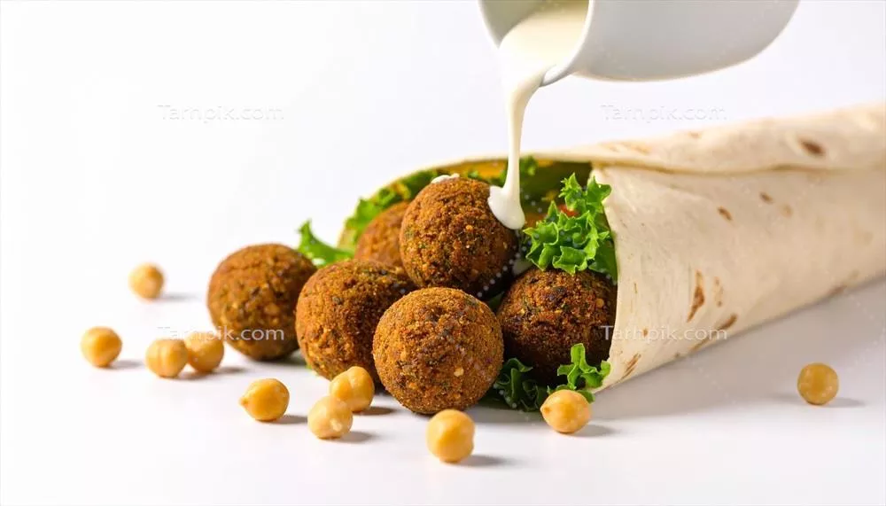 طرز تهیهWrap فلافل خوشمزه با سس خامه‌ای و کاهو