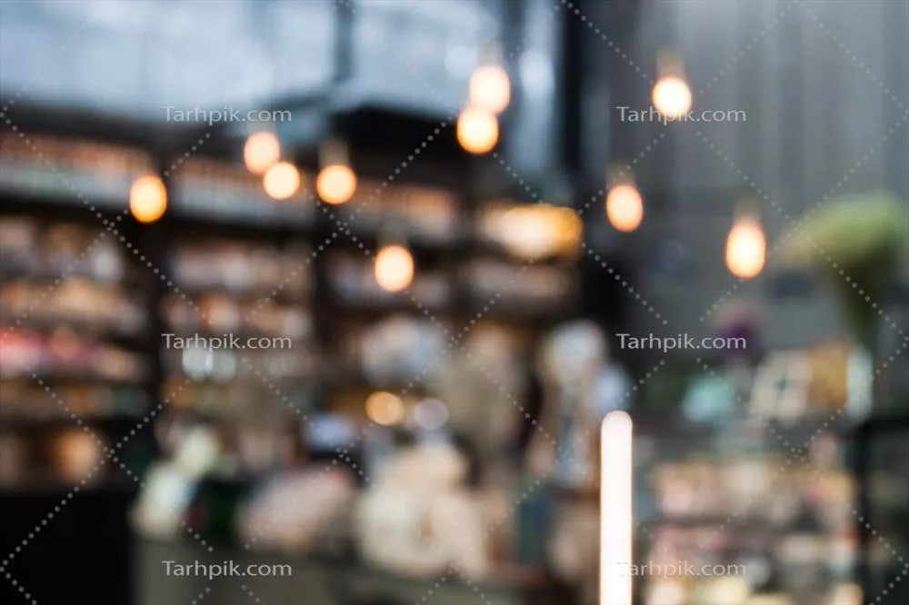 عکس پشتزمینهی مبهم یک کافه با حس و حال دلنشین و شلوغی