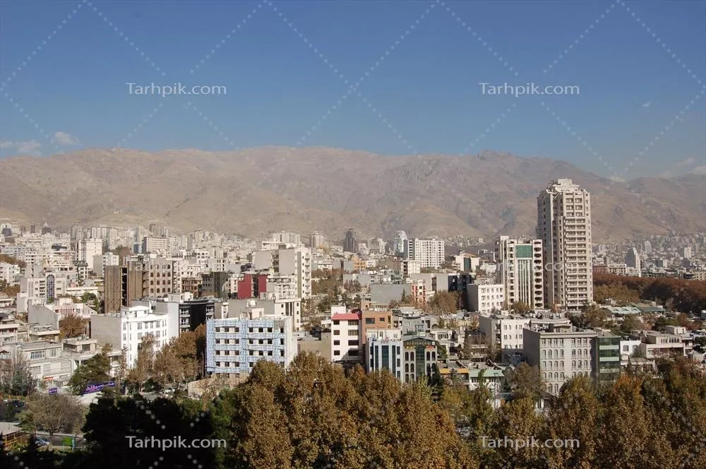 عکس نمایی زیبا از شهر تهران با کوه های البرز در پس زمینه