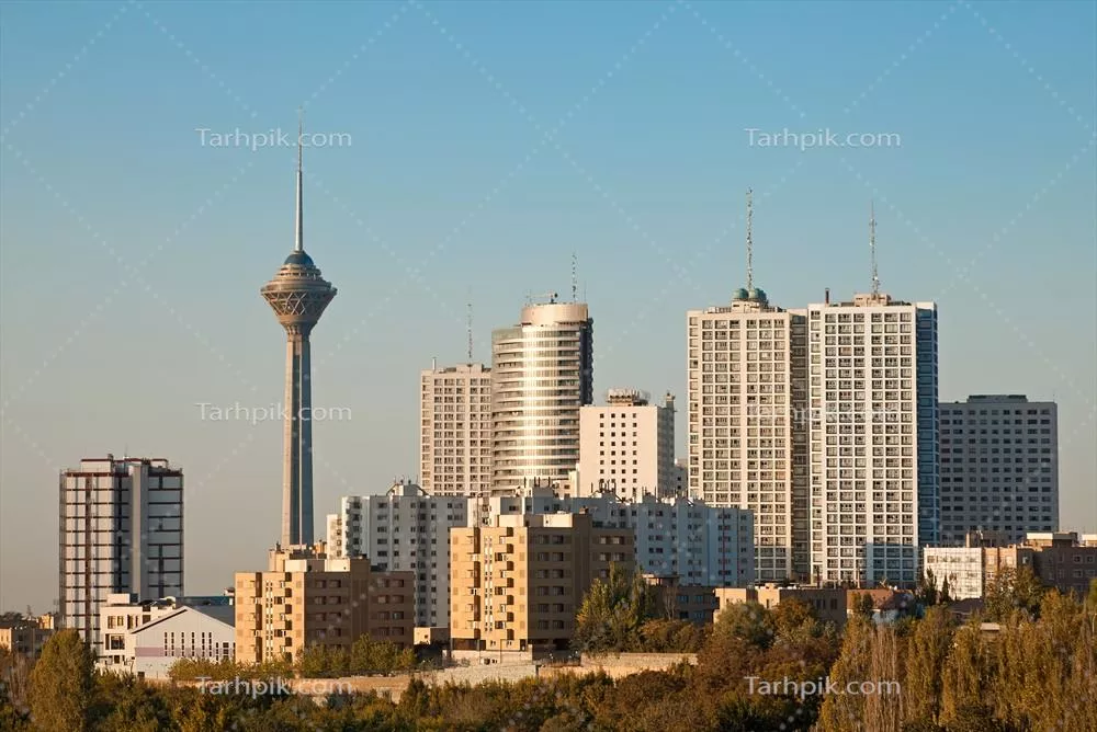 عکس نمایی زیبا از خطوط افق شهری تهران با برج میلاد در میان ساختمانهای مرتفع