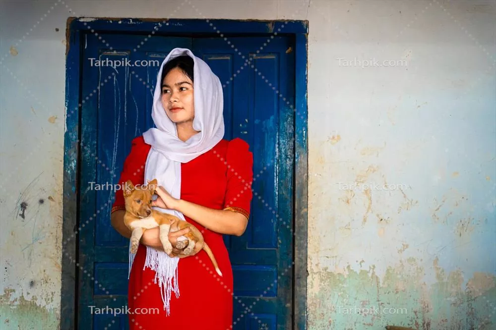 عکس پرتره ای از دختر قوم چم در روستای سفال باو ترک شهر فان رانگ، استان نین تهوان ویتنام