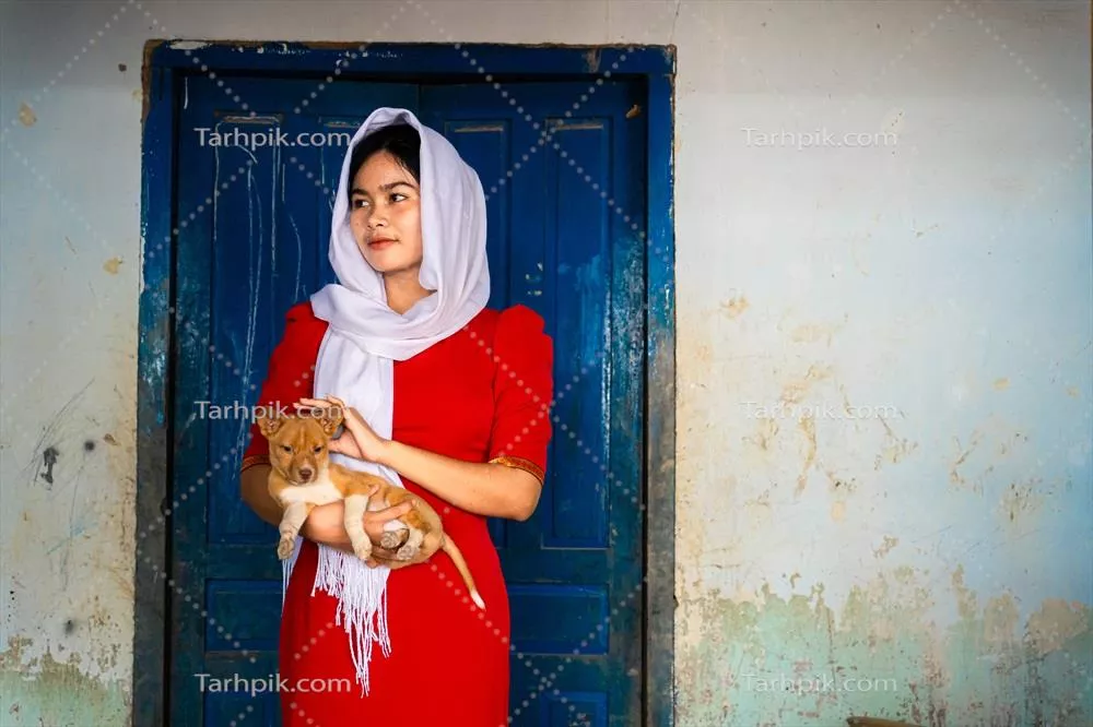 عکس پرتره‌ای از دختر اقوام چام در روستای سرامیک بائو تروک، شهر فَن رَنگ، استان نین تهوان ویتنام