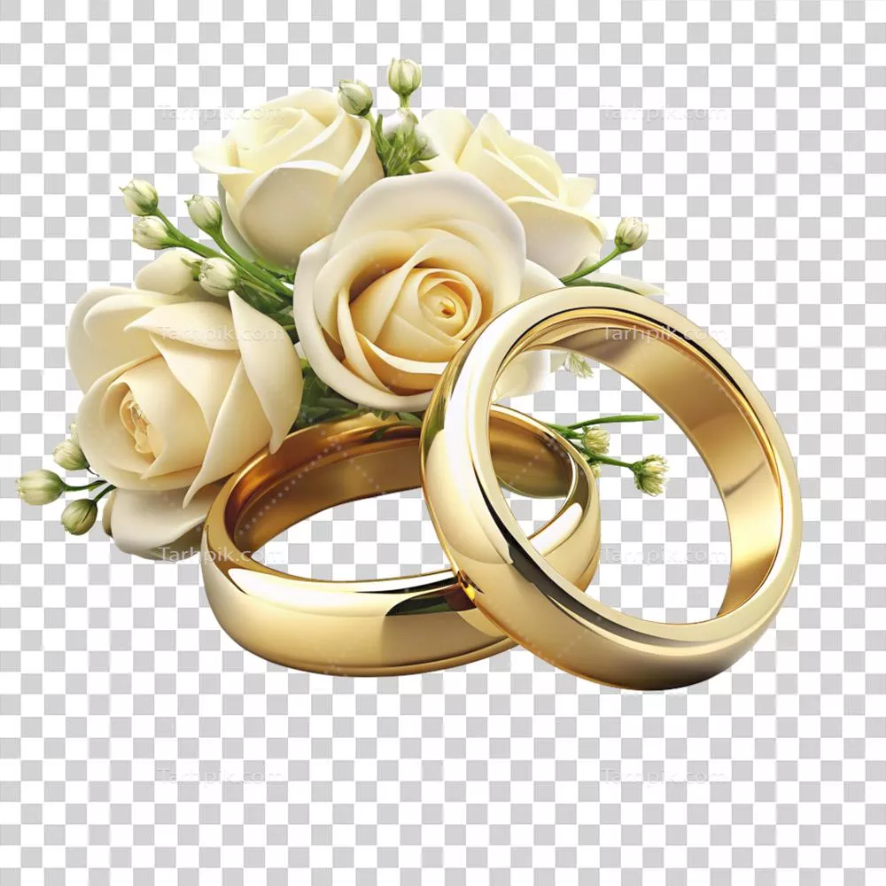 عکس دوربری جواهرات عروسی واقعی با گلها: حلقههای نماد عشق و زیبایی