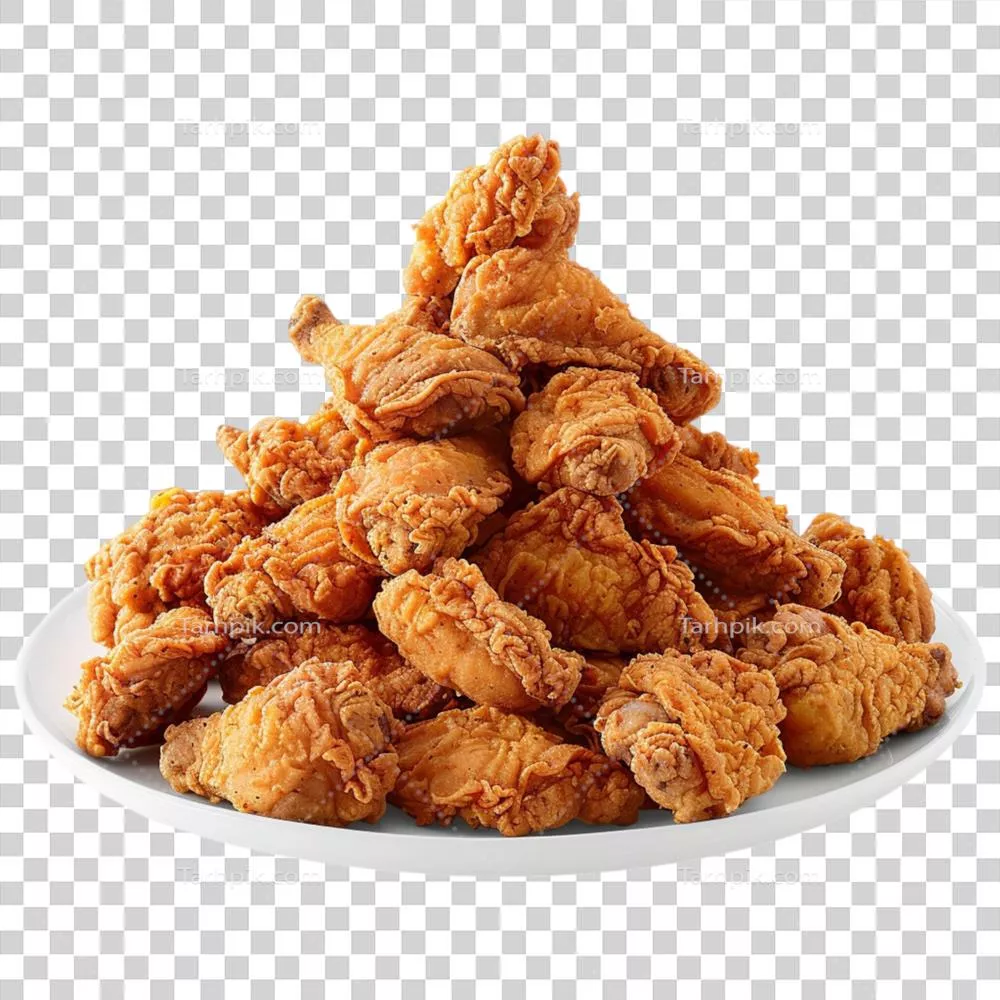 عکس دوربری یک بشقاب مرغ سرخ شده بر روی بشقاب سفید با پس زمینه شفاف