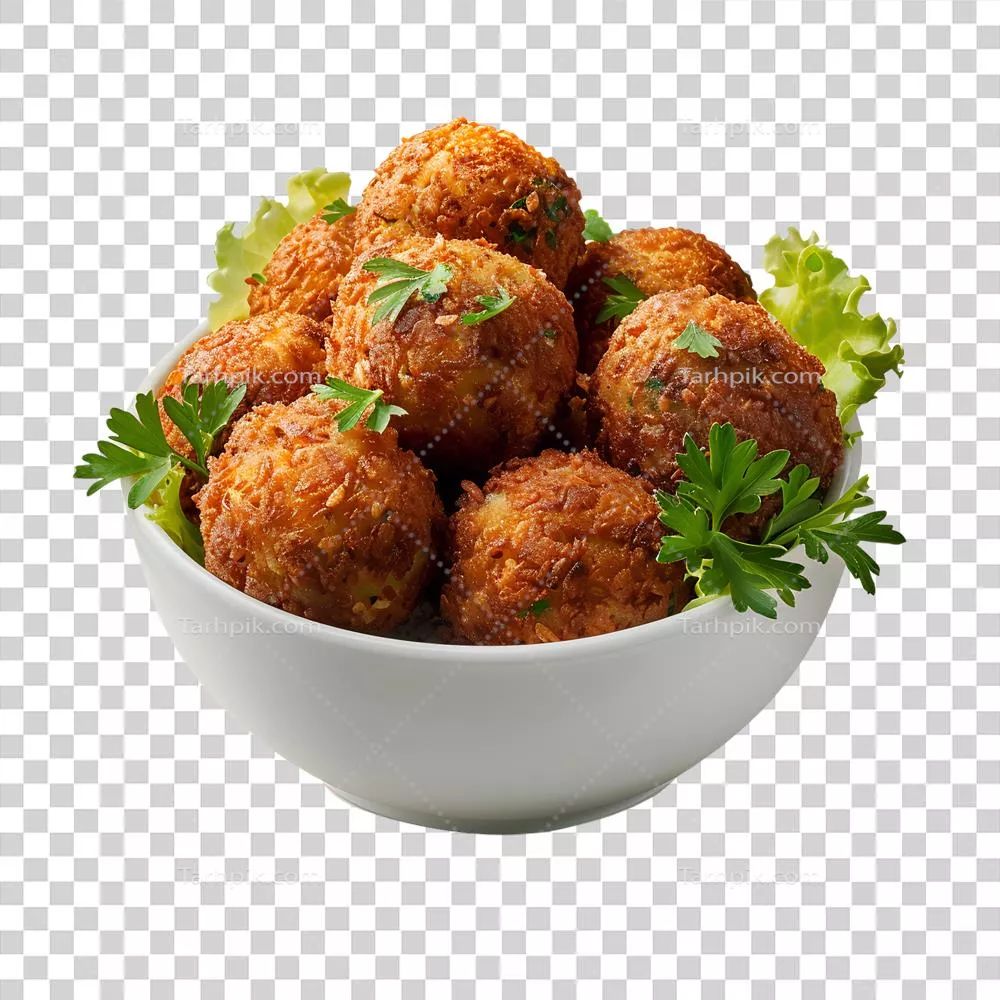 عکس دوربری کاسه‌ای از کوفته‌های گوشتی با جعفری روی آن