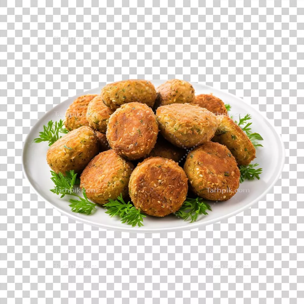 عکس دوربری کره‌های فلافل خوشمزه و قهوه‌ای طلایی روی پس‌زمینه شفاف
