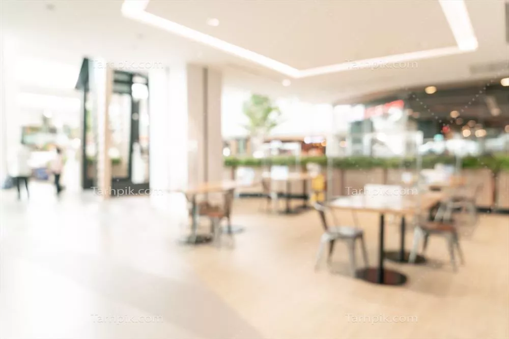 عکس پس‌زمینه رنگی و مبهم از فودکورت در مرکز خرید برای طراحی‌های هنری