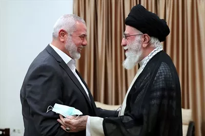 عکس دیدار رهبر شهید انقلاب و شهید اسماعیل هنیه