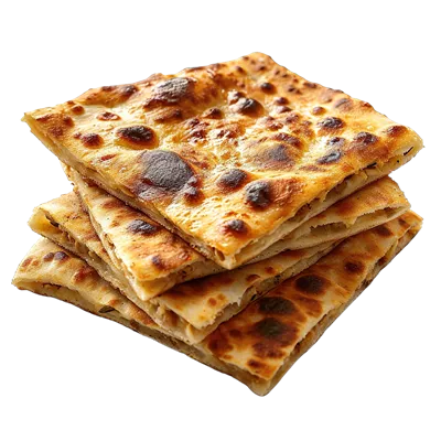عکس دوربری یک توده چهار نان تخت با پوسته قهوه‌ای طلایی بر روی پس‌زمینه شفاف