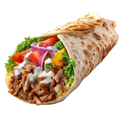عکس دوربری دونر کباب خوشمزه با سبزیجات تازه در پسزمینه شفاف