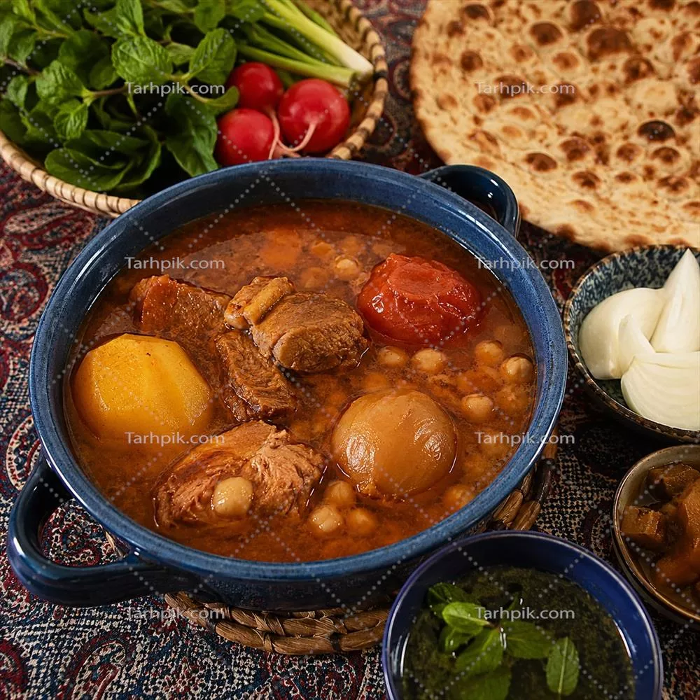 عکس دیزی سنگی خوشمزه با مخلفات لذیذ و متنوع بر روی میز