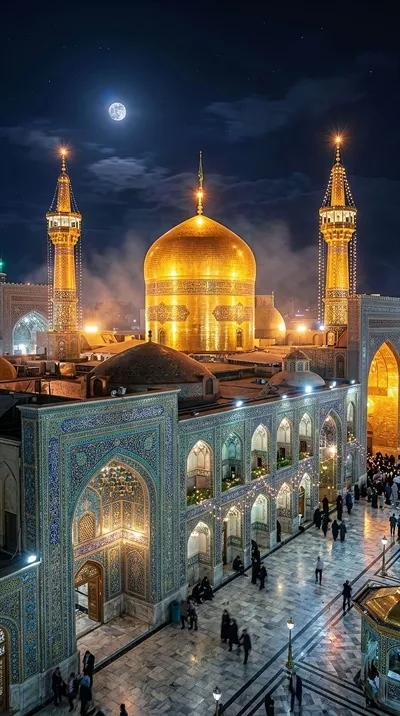 عکس تصویر زیبای گنبد طلایی امام رضا در شب با نورهای خیرهکننده