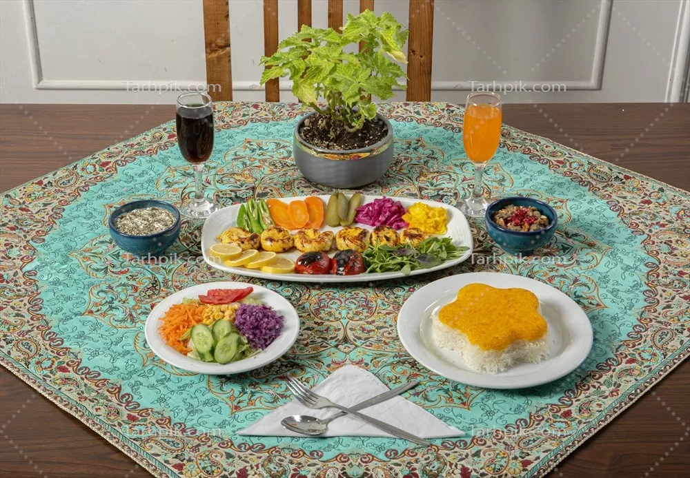عکس میز غذا با جوجه حلزونی و برنج کته
