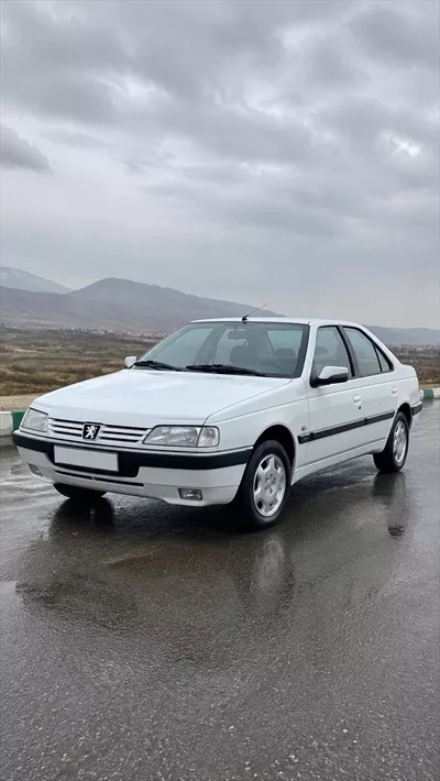 عکس تجربه رانندگی در باران با پژو ۴۰۵