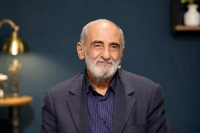عکس حسین شریعتمداری مدیر کیهان با تصویر رسمی