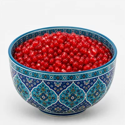 عکس انار داخل ظرف با طراحی ایرانی برای تزئین سفره هفت سین