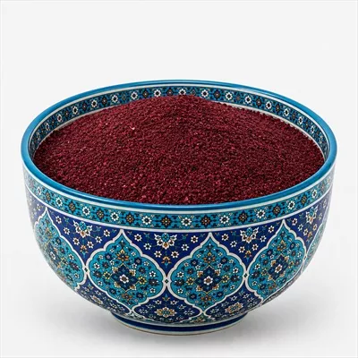 عکس سماق داخل ظرف با طراحی و نقش و نگار ایرانی برای سفره هفت سین