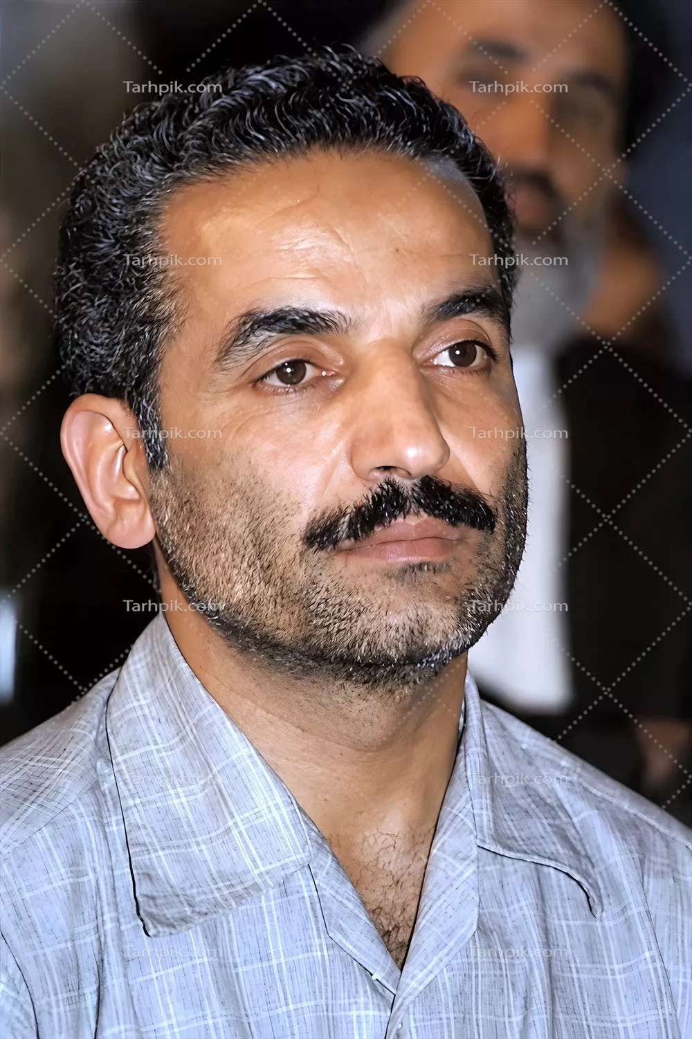 عکس بازسازی شده شهید رجایی، نماد خدمت و فداکاری